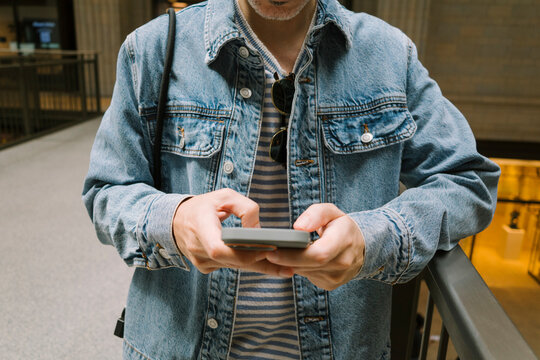 Man holding phone close-up