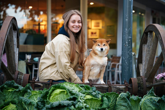 Posing with installation on autumn market