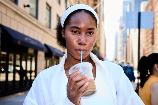 Woman crosses the boulevard in NYC