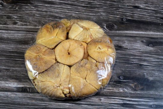 Dried figs fruit that is used in Ramadan Khoshaf or compote with dried dates fruit and apricot paste that Muslims start their breakfast in Ramadan on it, Ramadan food background