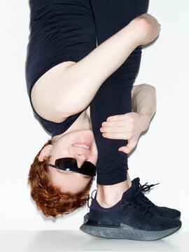 Flexible funny person in sport wear