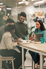 Diverse professional team collaborating during office meeting