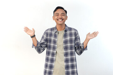 Fototapeta premium Asian man wearing a plaid shirt with a winking expression is gesturing on an isolated white background.