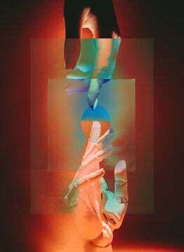 Hands grasping a colorful glowing sphere