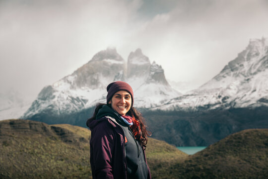 Portrait of smiling traveler in Torres del Paine, Chile