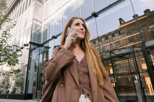  Woman talking on smartphone