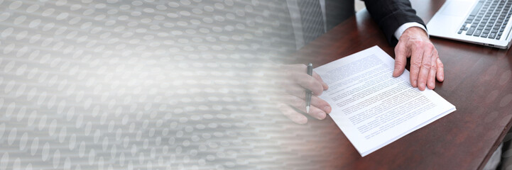 Naklejka premium Businessman reading and checking document (lorem ipsum text used); panoramic banner