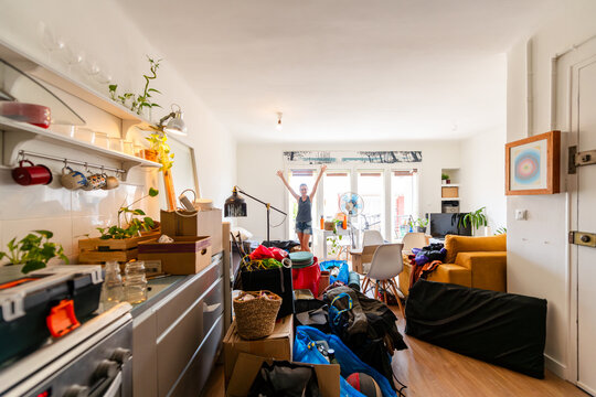 Celebrating Success Surrounded by Moving Day Mess