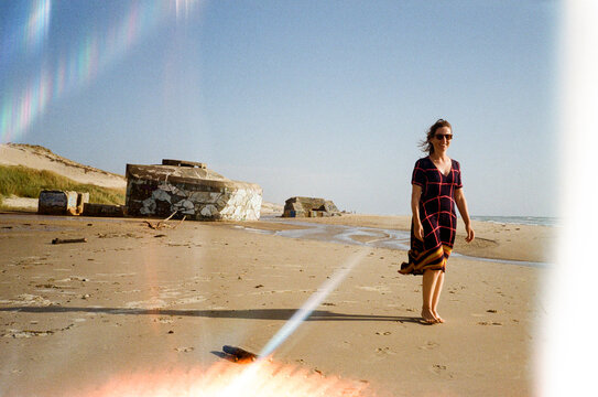 Empty beach with second world war bunker Ruins
