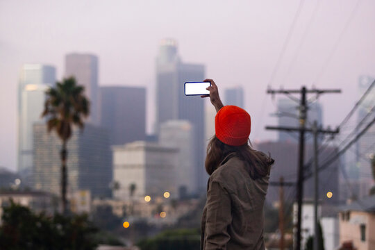 Man taking photo with smartphone Los Angeles 