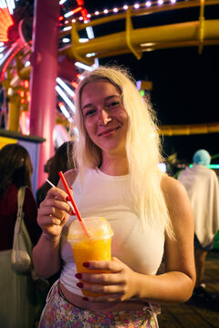Attractive lady visits funfair