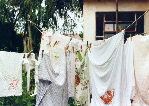 Clothes and linens drying outdoors 