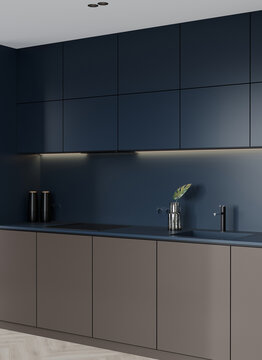 Small dark kitchen in home or hotel room studio. Blue-brown colors