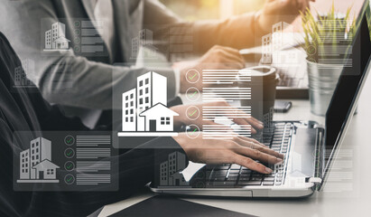 Naklejka na ściany i meble A professional engages with a laptop in a modern office, surrounded by digital icons of real estate and checklists, emphasizing technology in property management and investment. Gantry