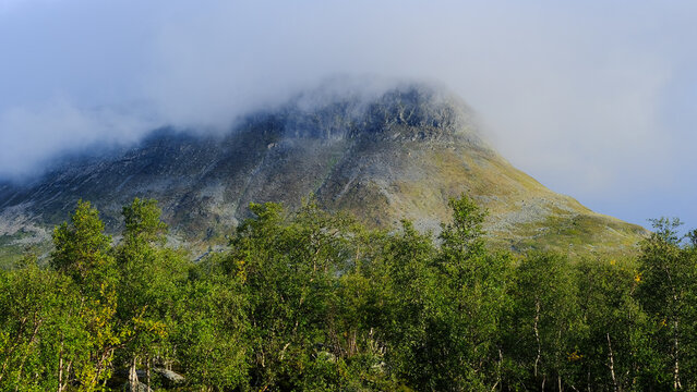 Saana fell shrouded in thick mist and low clouds, Kilpisjarvi, Enontekio, Finnish Lapland. It&acute;s legendary sacred fell of the S&aacute;mi peoples.