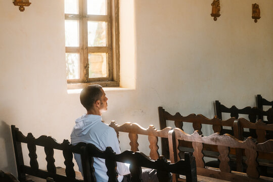 Person sitting in Historic Mission,  San Antonio, Texas