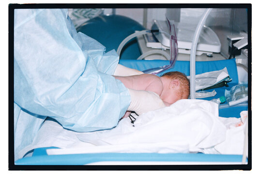 Newborn baby receiving care in a hospital