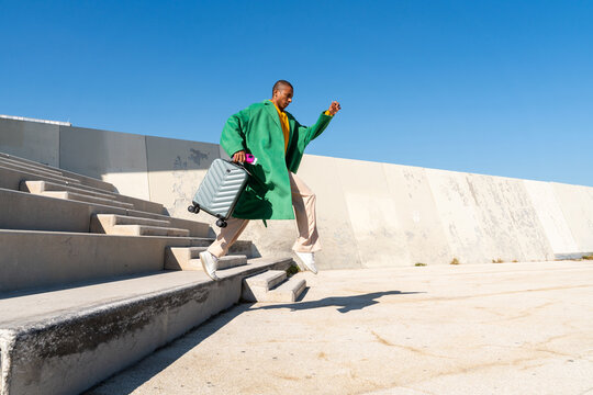 Traveler runs clear blue sky