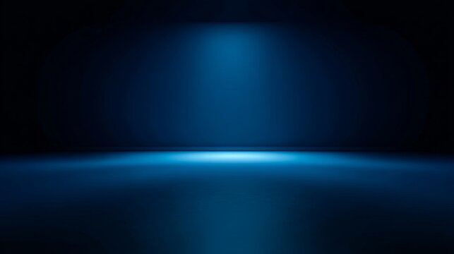 Dramatic blue spotlight on dark empty stage