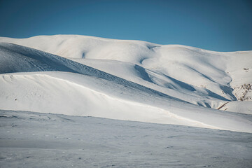 snow covered mountains in winter