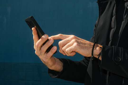 Closeup Man Using Mobile Phone