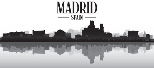 Obraz premium Black and white panoramic poster of the city skyline with misty background buildings and water reflection of MADRID, SPAIN