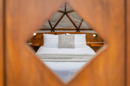 Bed Seen Through Door