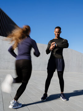 A man uses an electronic watch during sports