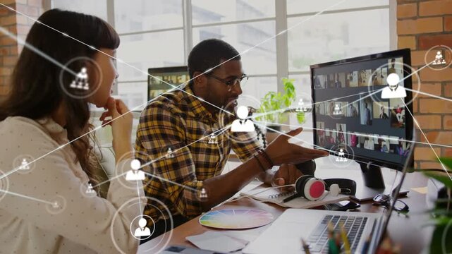 Animation of network fo connections over diverse business people in office