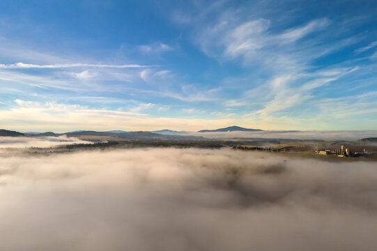 Aerial view of foggy landscape with Klet mountain in South Bohemia, Czech Republic
