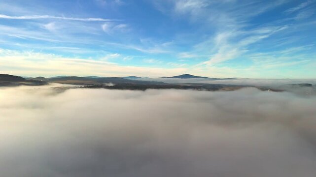 Aerial view of foggy landscape with Klet mountain, South Bohemia, Czech Republic