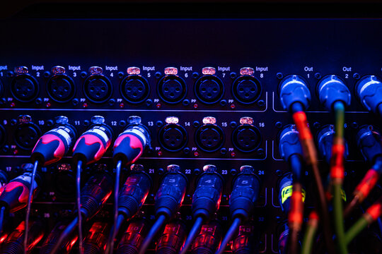 Professional Audio Stagebox with XLR Connectors and Cables in Studio Lighting