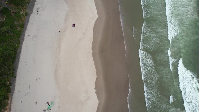Aerial of Arcadia beach in the pacific northwest of Oregon. Bird eye of beach and waves.