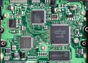 Close up macro of the computer board inside a hard drive