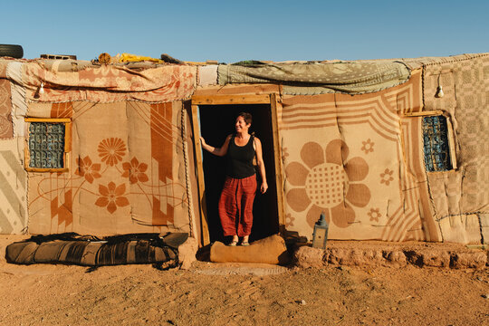 Visitor at Desert Cabin Entrance