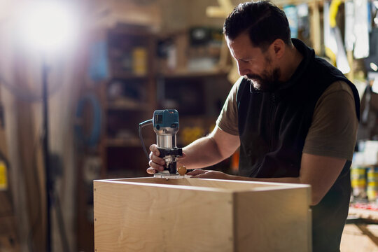 Crafting a wooden project with precision in a workshop