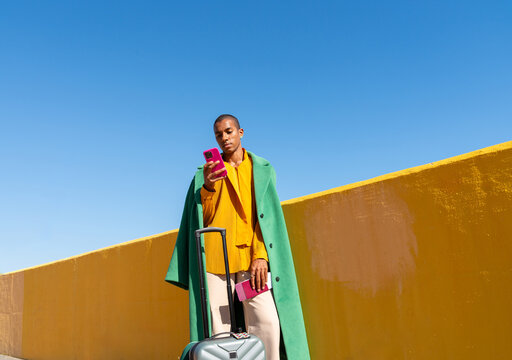 Traveler Holding Passport and Phone