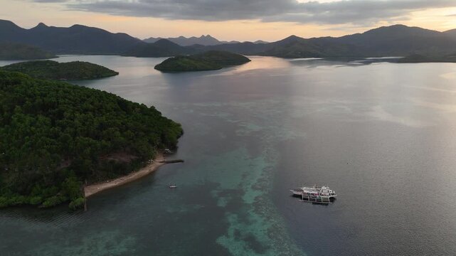 Drone aerial view of Palomaria Island basecamp near Coron in the Philippines