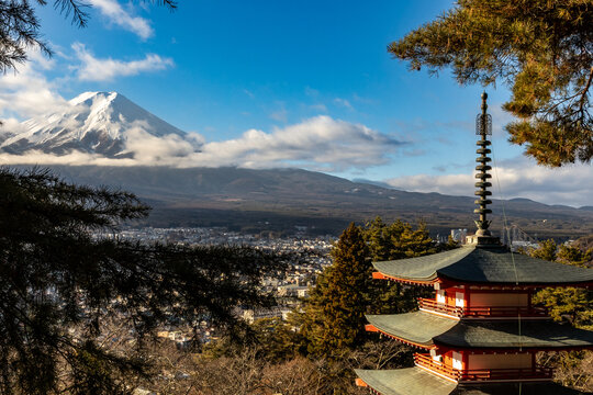 Mount Fuji and Chureito Pagoda with city view in Fujiyoshida, Japan