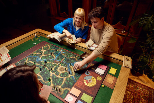 People play board games
