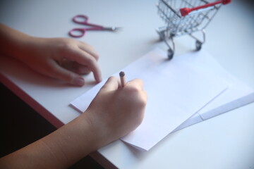 children writing on a notebook