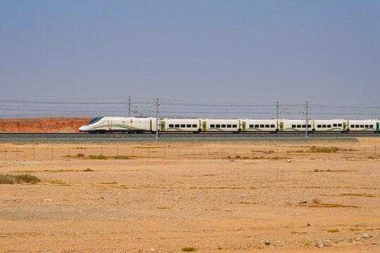 Haramain High Speed Train model Talgo 350 speeding through the Saudi Arabian desert between Medina and Mecca