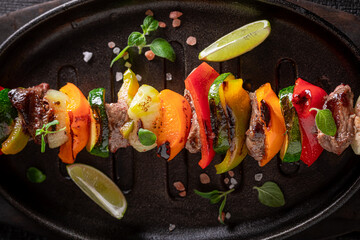 Spicy roasted skewer with vegetables and beef.