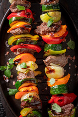 Spicy roasted skewer made of pepper, onion and beef.