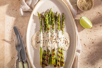 Green grilled asparagus as a summer delicacy.