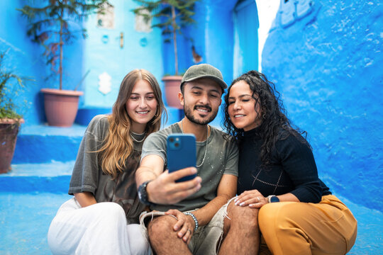 Family selfie in the blue streets of Chefchaouen