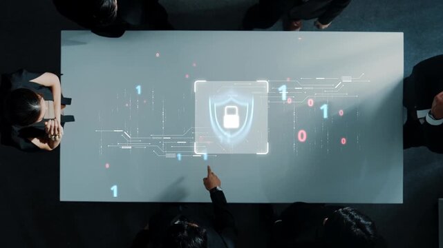 This image captures a modern digital security concept with individuals at a table discussing data protection strategies, highlighted by a binary code overlay. Raster