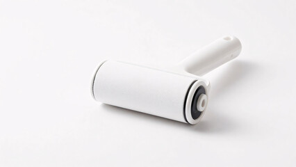 A clean white lint roller featuring a textured adhesive paper roll rests diagonally on a pristine white background, providing a minimalist template for household cleaning product mockups.