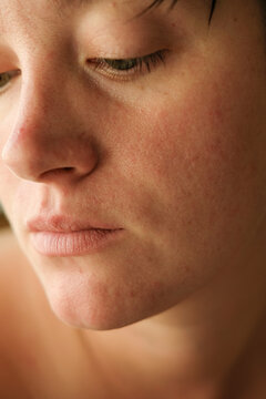 Close-up of a Woman in Deep Thought During Quiet Afternoon