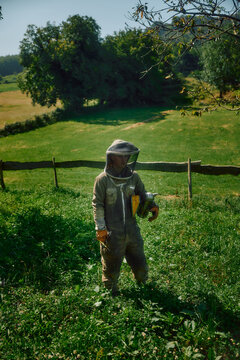 beekeeper in the field
